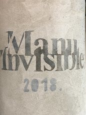 La firma di Manu Invisible